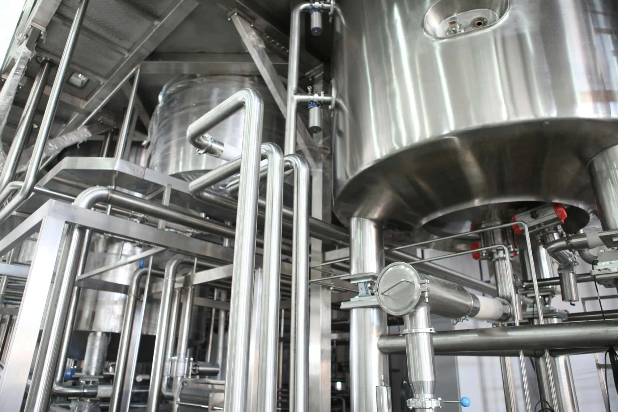 Stainless-steel processing vessels and pipework in a clean production area