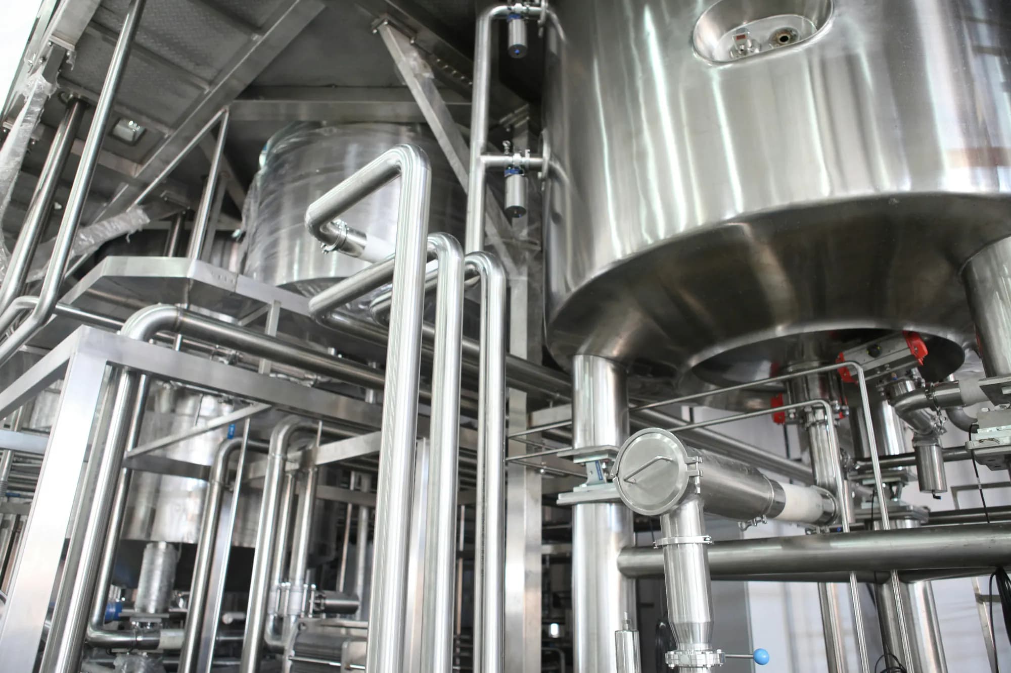 Stainless-steel processing vessels and pipework in a clean production area